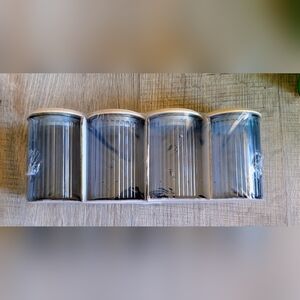 Set of 4 Blue Ribbed Glass Jars